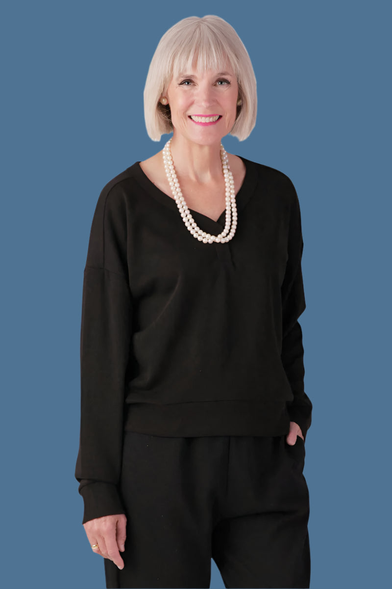 V-Neck Sweatshirt for women by Buck & Buck in Black, and available in different sizes. This tops item is part of our sweatshirts collection.