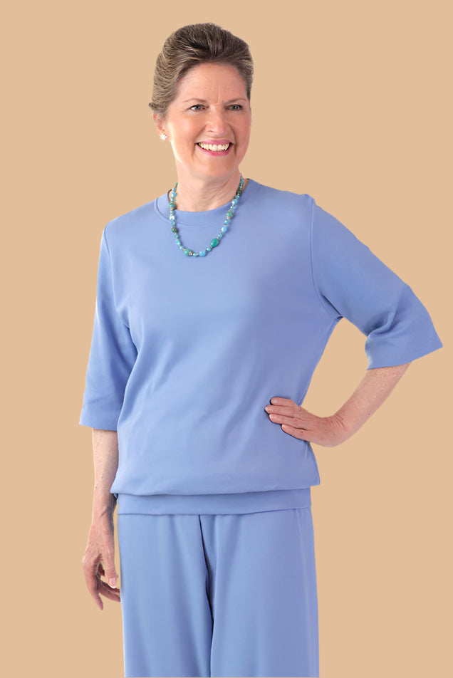 Women's 3/4 Sleeve Banded Bottom Top by Buck & Buck, and available in different sizes. This tops item is part of our blouses collection.