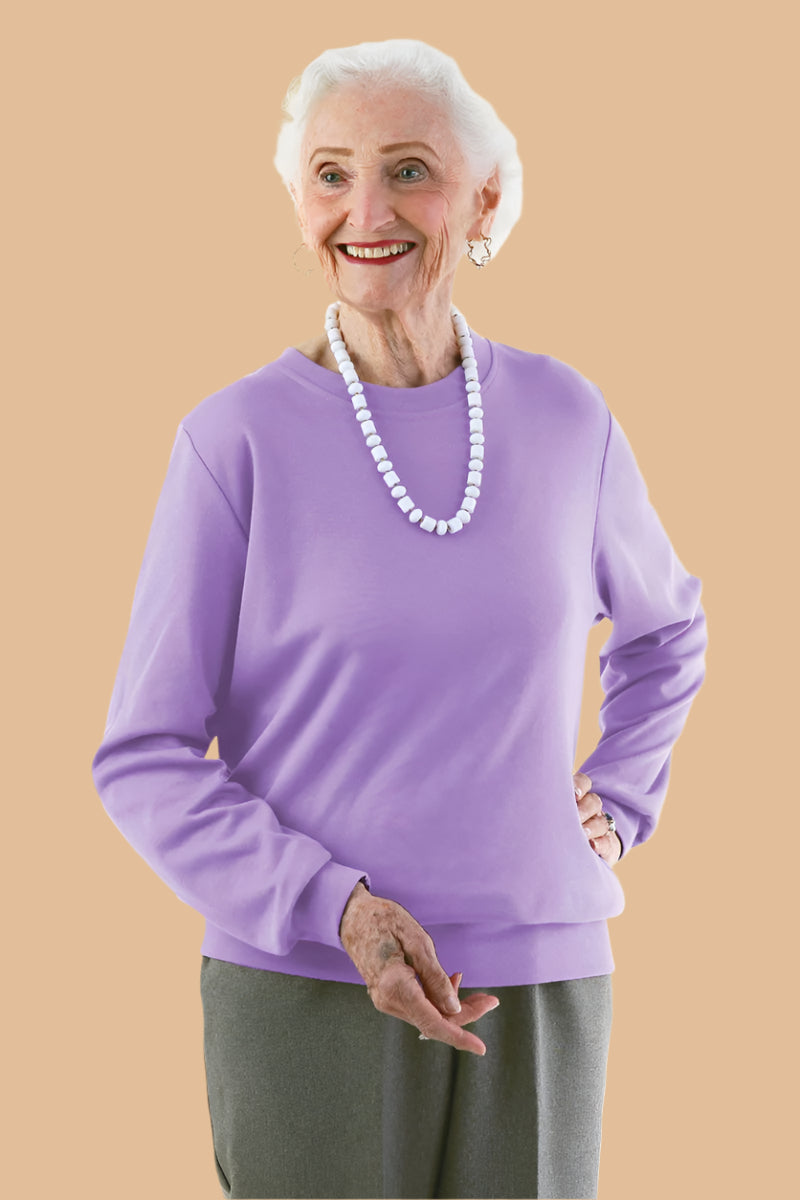 Women's Long Sleeve Banded Bottom Top by Buck & Buck in Lilac, and available in different sizes. This tops item is part of our blouses collection.