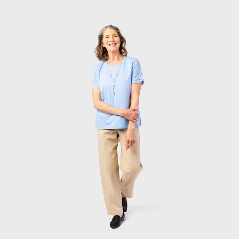 The Women's Short Sleeve Eyelet Top by Alfred Dunner in blue and available in different sizes. This top is part of our women's blouses collection.