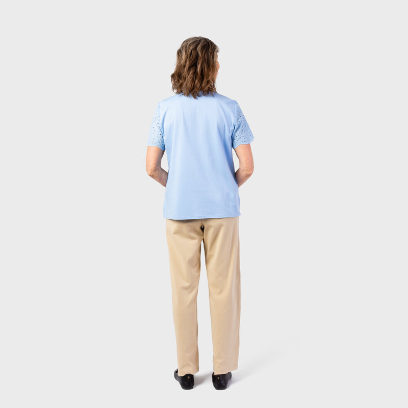 The back view of our Women's Short Sleeve Eyelet Top by Alfred Dunner in blue and available in different sizes. This top is part of our women's blouses collection.