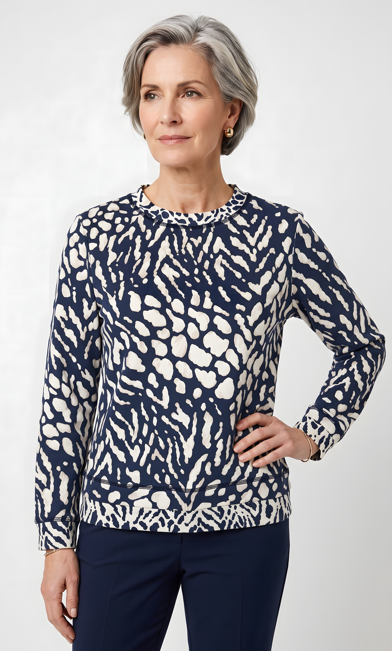 The women's everyday knit top by Alfred Dunner in Animal and available in different sizes. This top is part of our women's blouses collection.