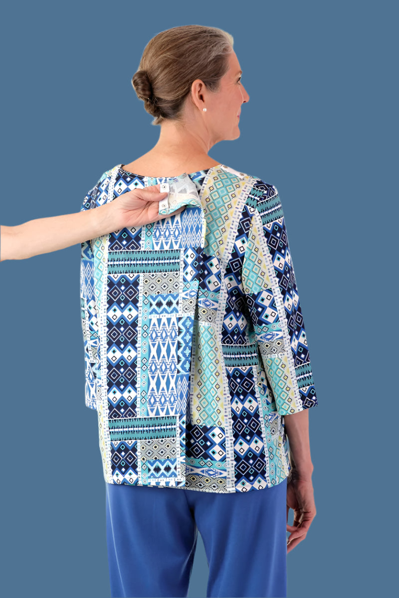 Poly Wrap Back Round Neck Blouse for women by Buck & Buck, and available in different sizes. This tops item is part of our blouses collection.