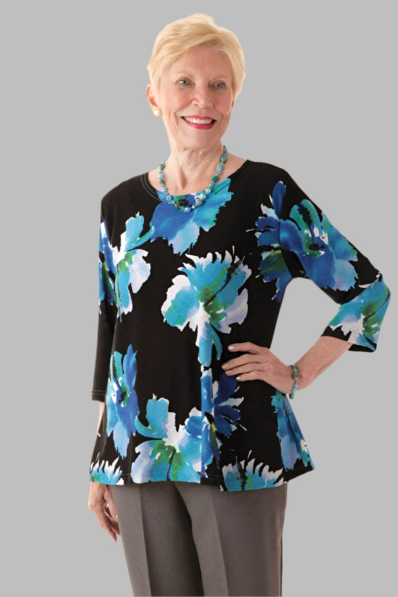 Poly Wrap Back Round Neck Blouse for women by Buck & Buck, and available in different sizes. This tops item is part of our blouses collection.