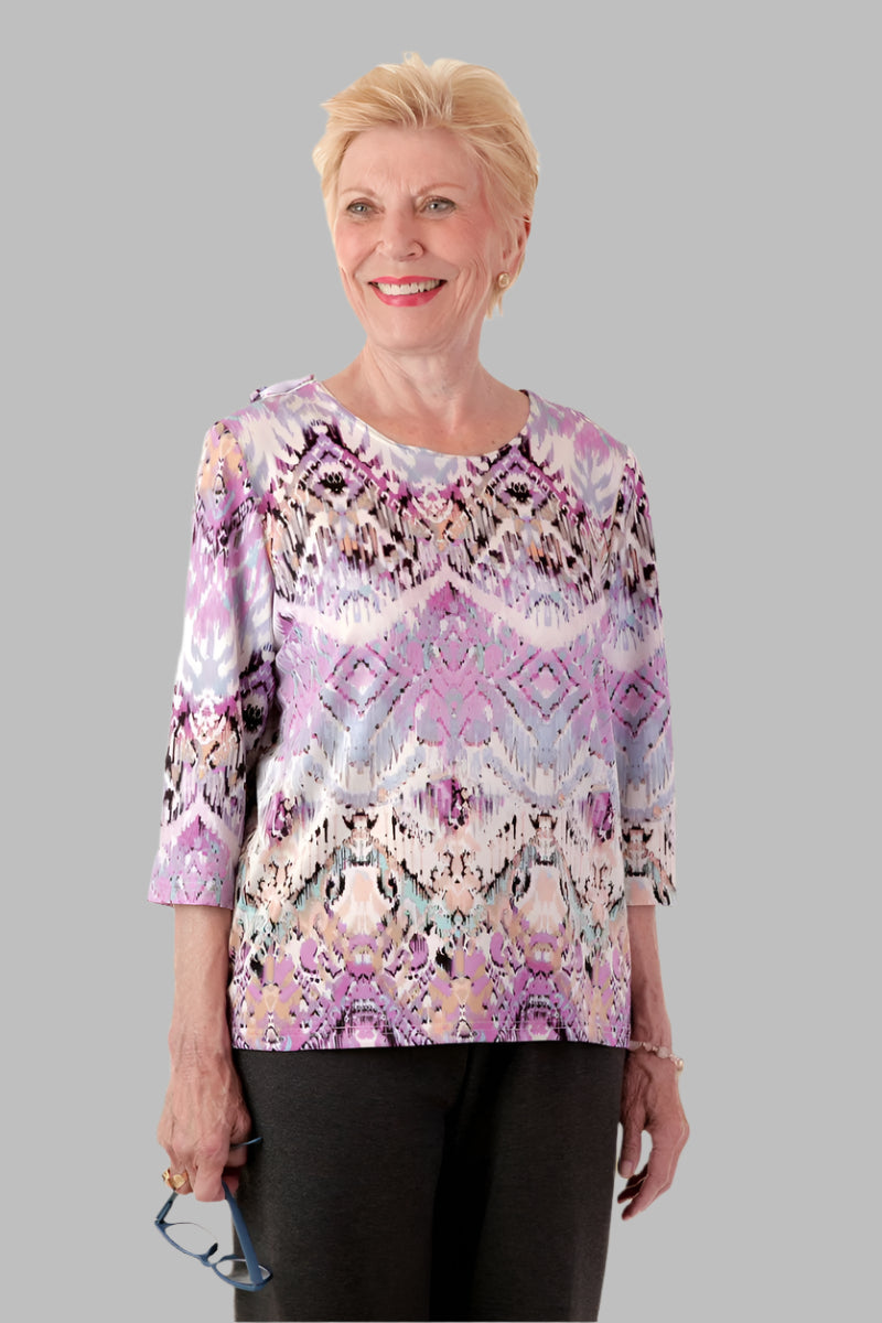 Poly Wrap Back Round Neck Blouse for women by Buck & Buck, and available in different sizes. This tops item is part of our blouses collection.