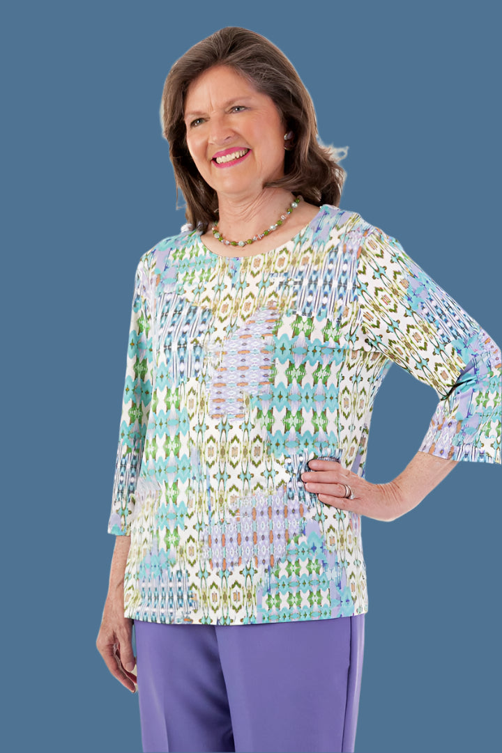 Poly Wrap Back Round Neck Blouse for women by Buck & Buck, and available in different sizes. This tops item is part of our blouses collection.