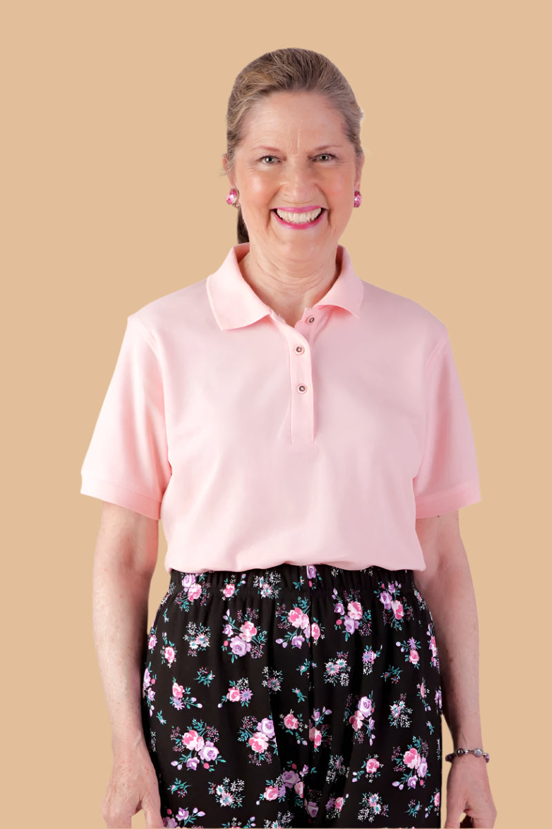 Women's Polo Shirt by Buck & Buck in White, and available in different sizes. This tops item is part of our polos collection.