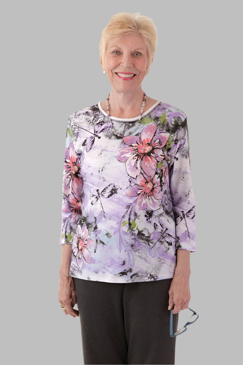 Snap Back Block Printed Knit Top for women by Buck & Buck in Black, and available in different sizes. This tops item is part of our blouses collection.