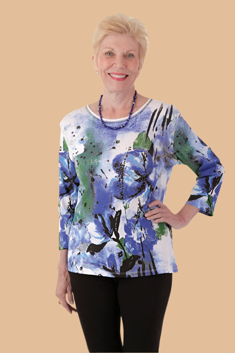 Snap Back Block Printed Knit Top for women by Buck & Buck in Black, and available in different sizes. This tops item is part of our blouses collection.