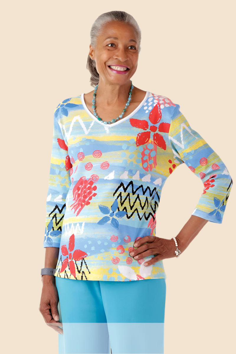 Snap Back Block Printed Knit Top for women by Buck & Buck, and available in different sizes. This tops item is part of our blouses collection.