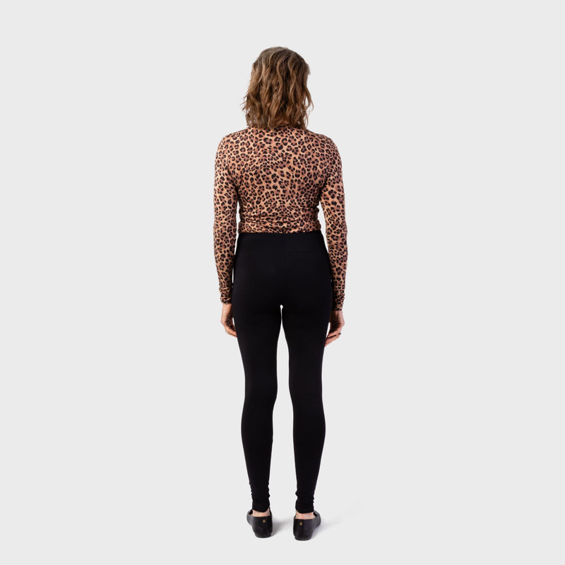 The Women's Cuddl Duds High Waist Leggings in black and available in different sizes. These leggings are part of our women's pajamas collection.