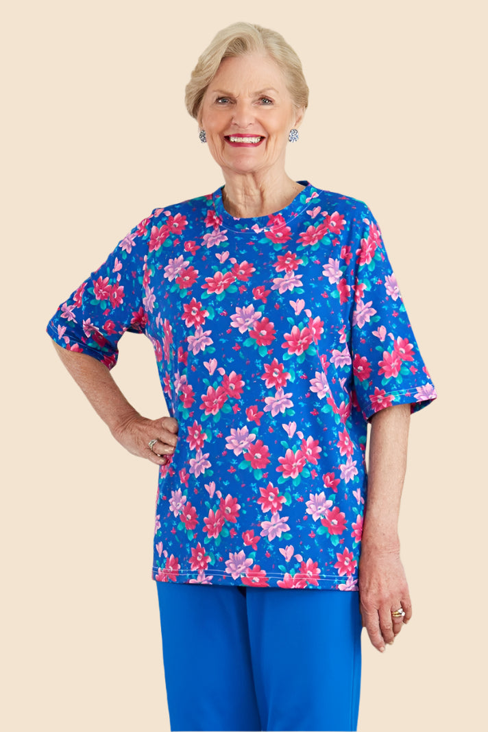 Short Sleeve Wrap Back Printed Knit Top for women by Buck & Buck, and available in different sizes. This tops item is part of our blouses collection.