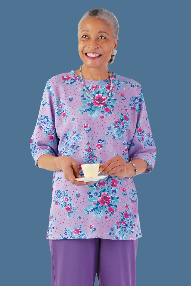 Short Sleeve Wrap Back Printed Knit Top for women by Buck & Buck, and available in different sizes. This tops item is part of our blouses collection.