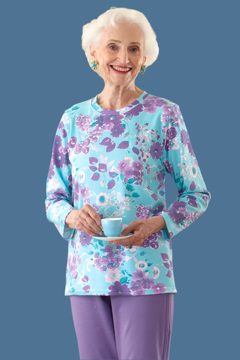 Long Sleeve Wrap Back Printed Knit Top for women by Buck & Buck, and available in different sizes. This tops item is part of our tunics collection.