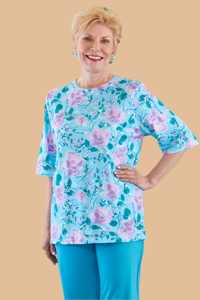 Short Sleeve Printed Knit Top for women by Buck & Buck in Blue, and available in different sizes. This tops item is part of our tunics collection.