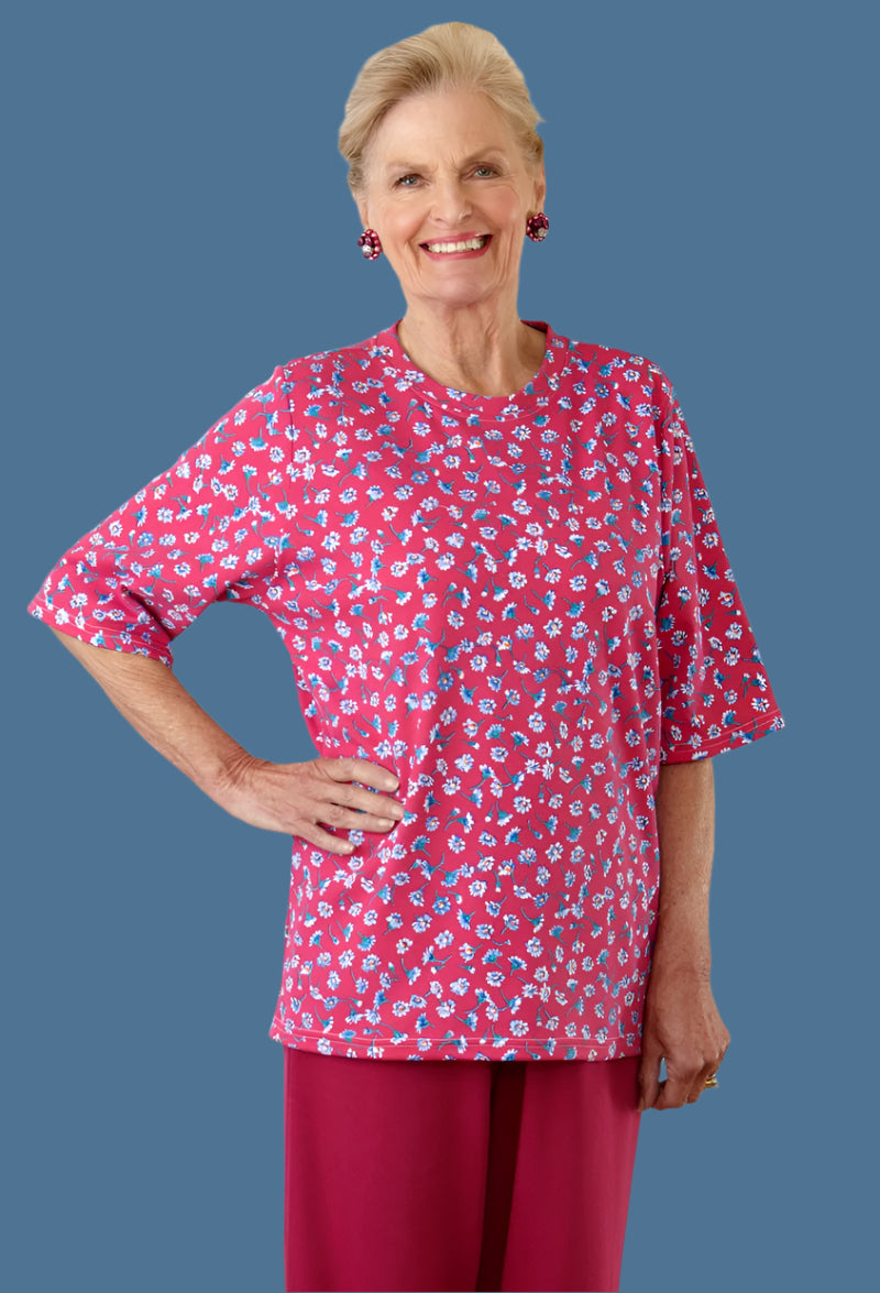 Short Sleeve Printed Knit Top for women by Buck & Buck in Red, and available in different sizes. This tops item is part of our tunics collection.