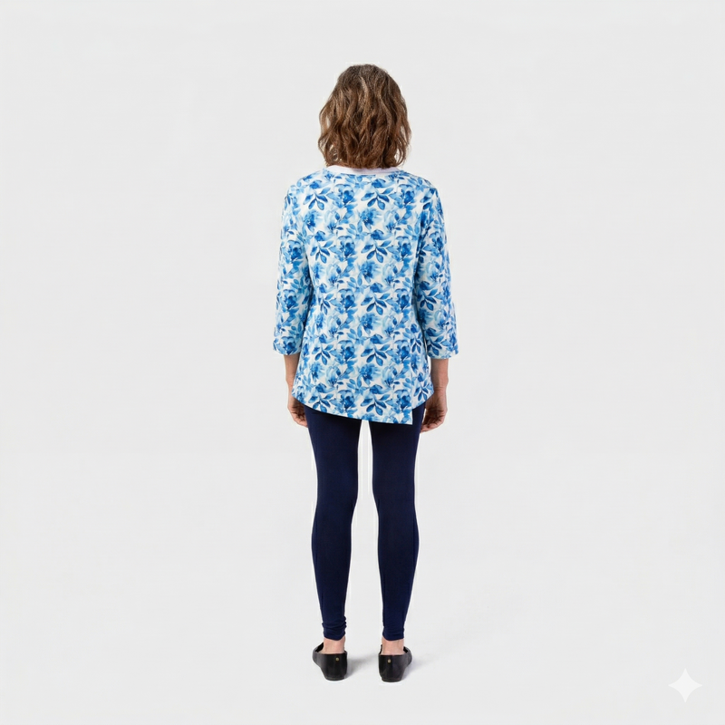 Women's Wrap Back Tunic by Buck & Buck in blue watercolor flowers, and available in different sizes. This wrap back item is part of our tops collection.