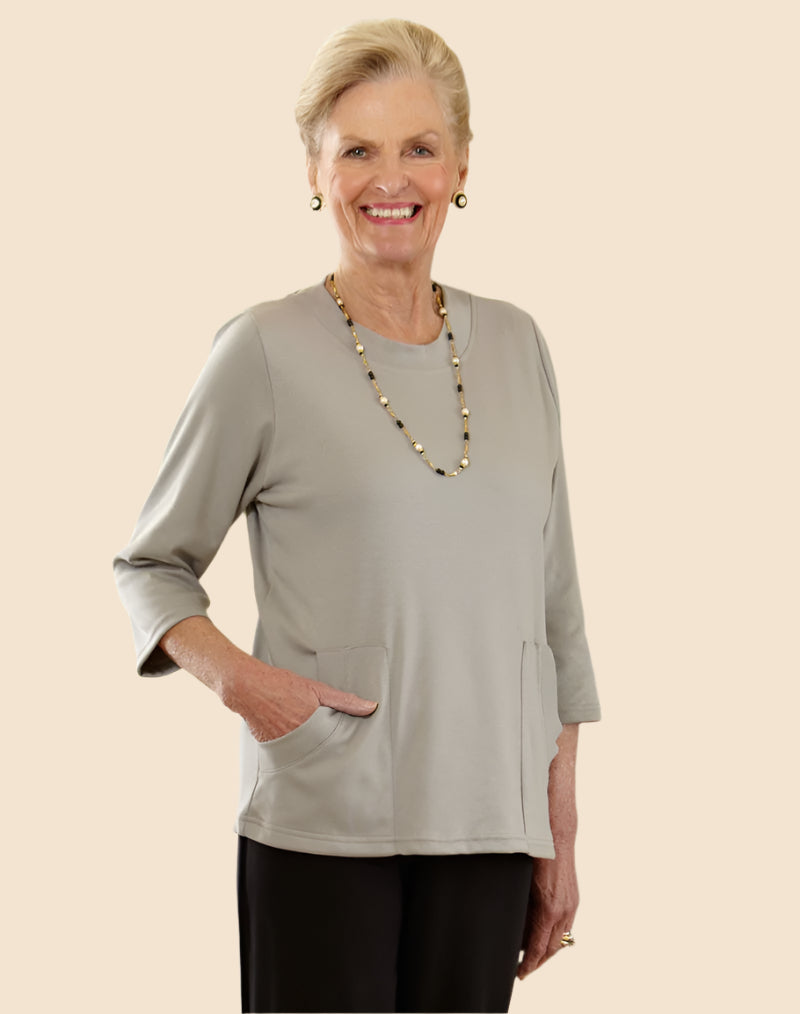 Solid Knit Top With Pockets for women by Buck & Buck in Tan/Beige, and available in different sizes. This tops item is part of our blouses collection.