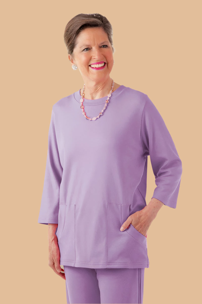 Solid Knit Top With Pockets for women by Buck & Buck in Lilac, and available in different sizes. This tops item is part of our blouses collection.