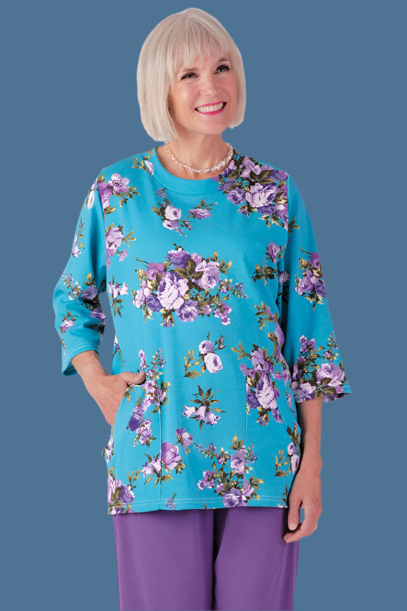 Printed Knit Top With Pockets for women by Buck & Buck in Blue, and available in different sizes. This tops item is part of our tunics collection.