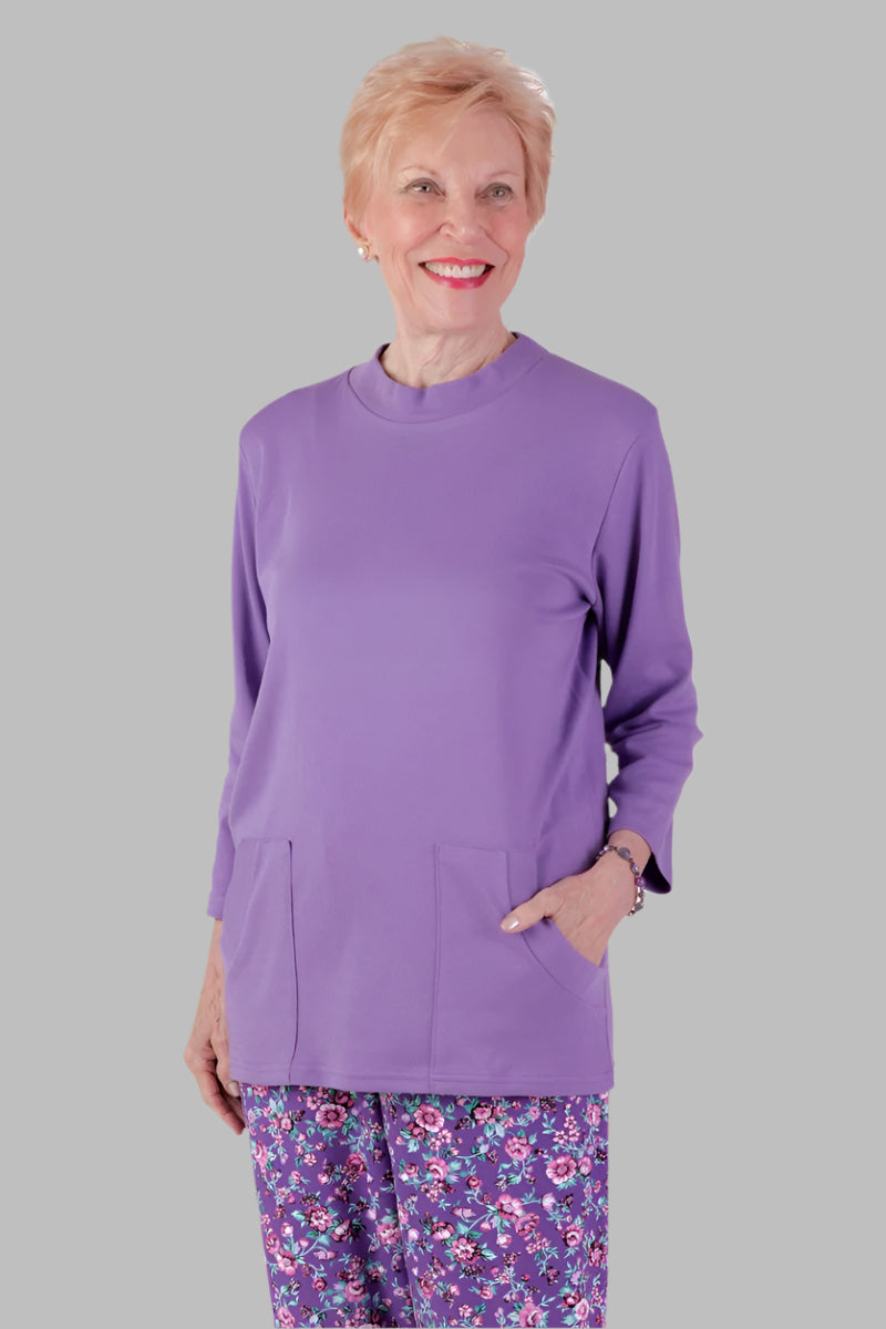 Solid Moon Pocket Wrap Back Top for women by Buck & Buck in Lilac, and available in different sizes. This tops item is part of our blouses collection.