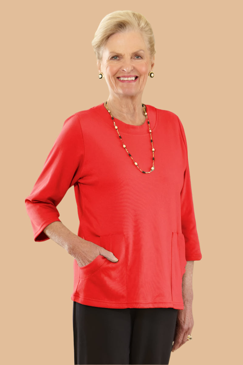 Solid Moon Pocket Wrap Back Top for women by Buck & Buck, and available in different sizes. This tops item is part of our blouses collection.