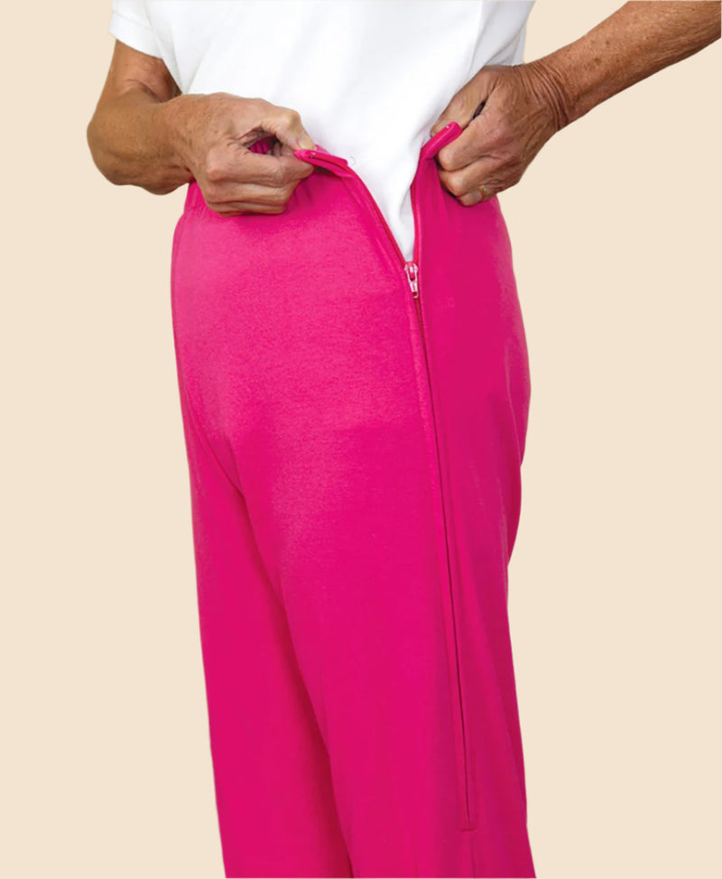 Women's Side-Zip Knit Pants by Buck & Buck in Fuchsia, and available in different sizes. This bottoms item is part of our pants collection.