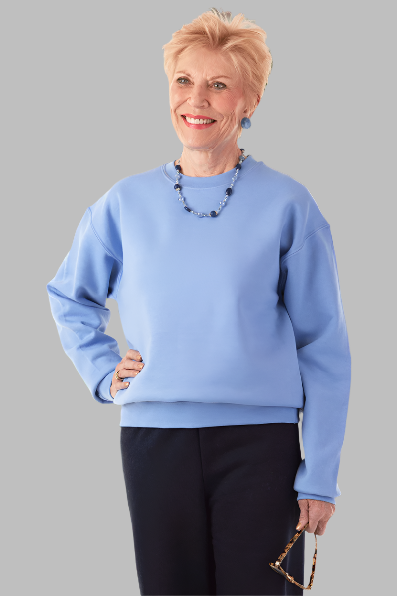 Women's Basic Sweat Top by Buck & Buck in medium blue, and available in different sizes. This tops item is part of our sweatshirts collection.