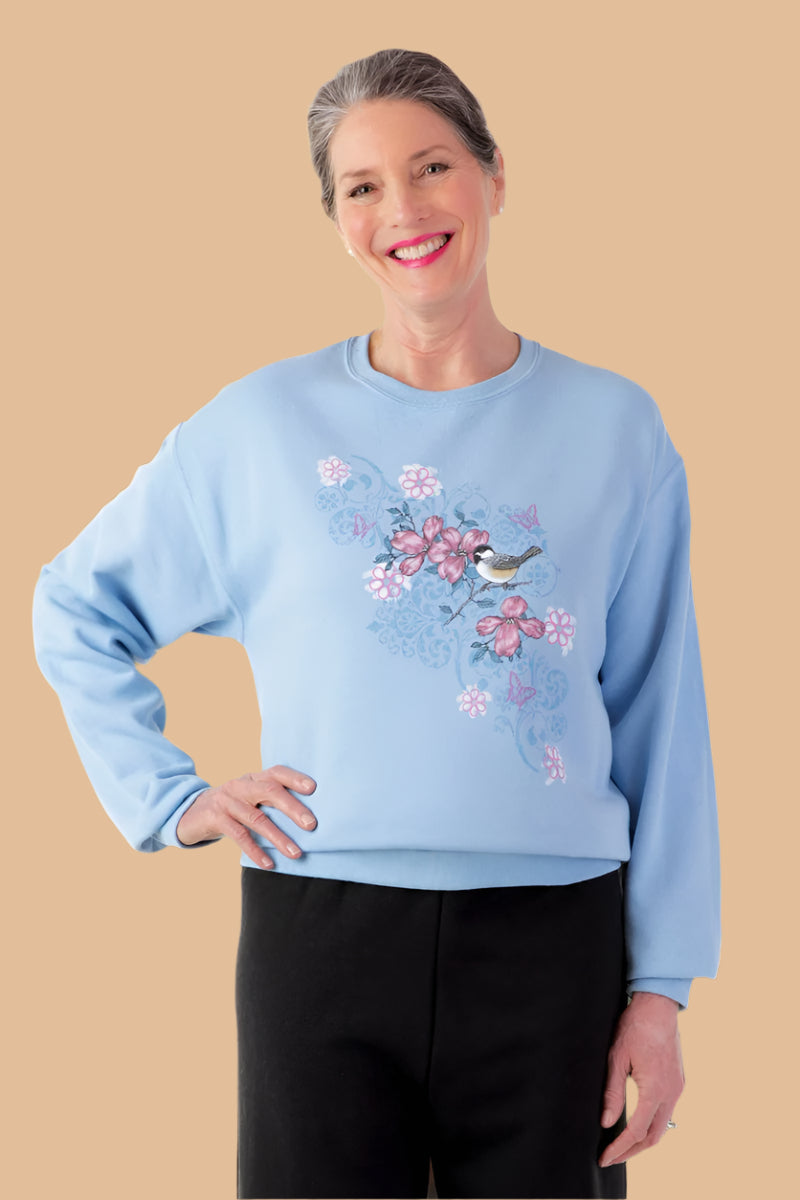 Women's Printed Sweat Top by Buck & Buck in blue, and available in different sizes. This tops item is part of our sweatshirts collection.