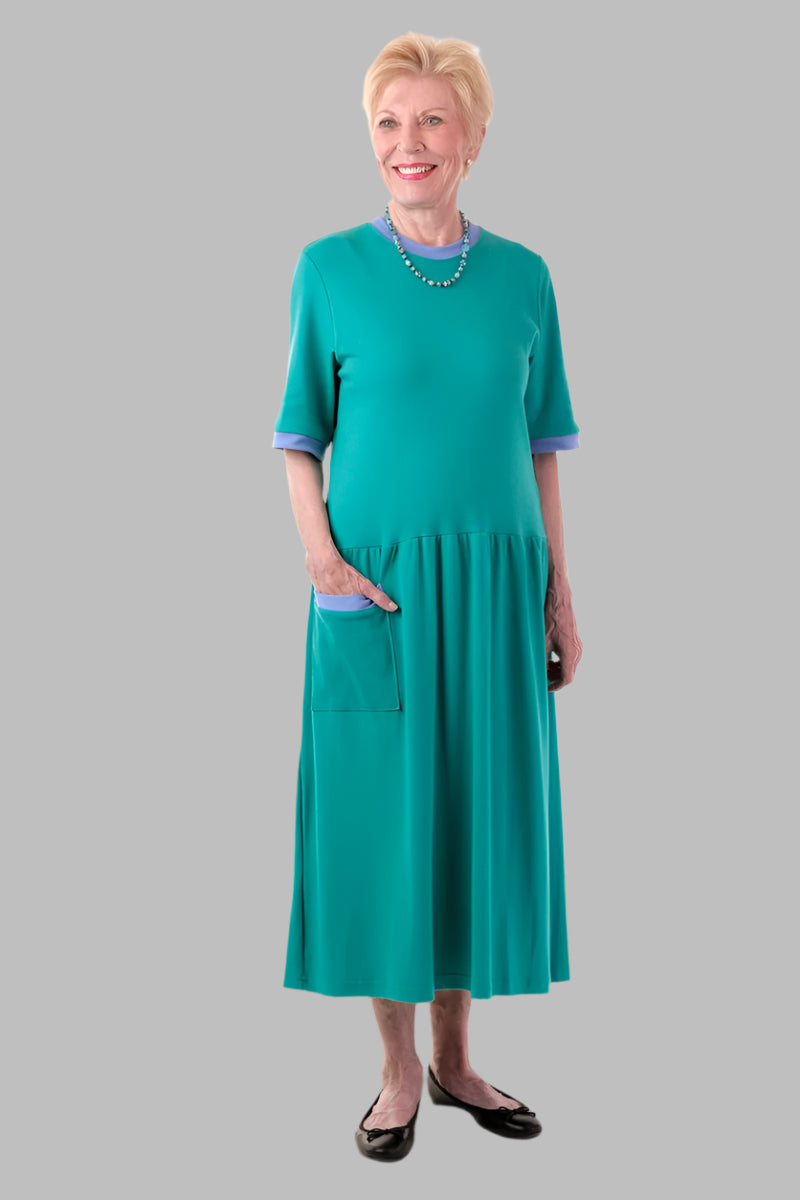 Short Sleeve Solid Knit Snap Back Dress for women by Buck & Buck in Medium Blue, and available in different sizes. This bottoms item is part of our dresses collection.