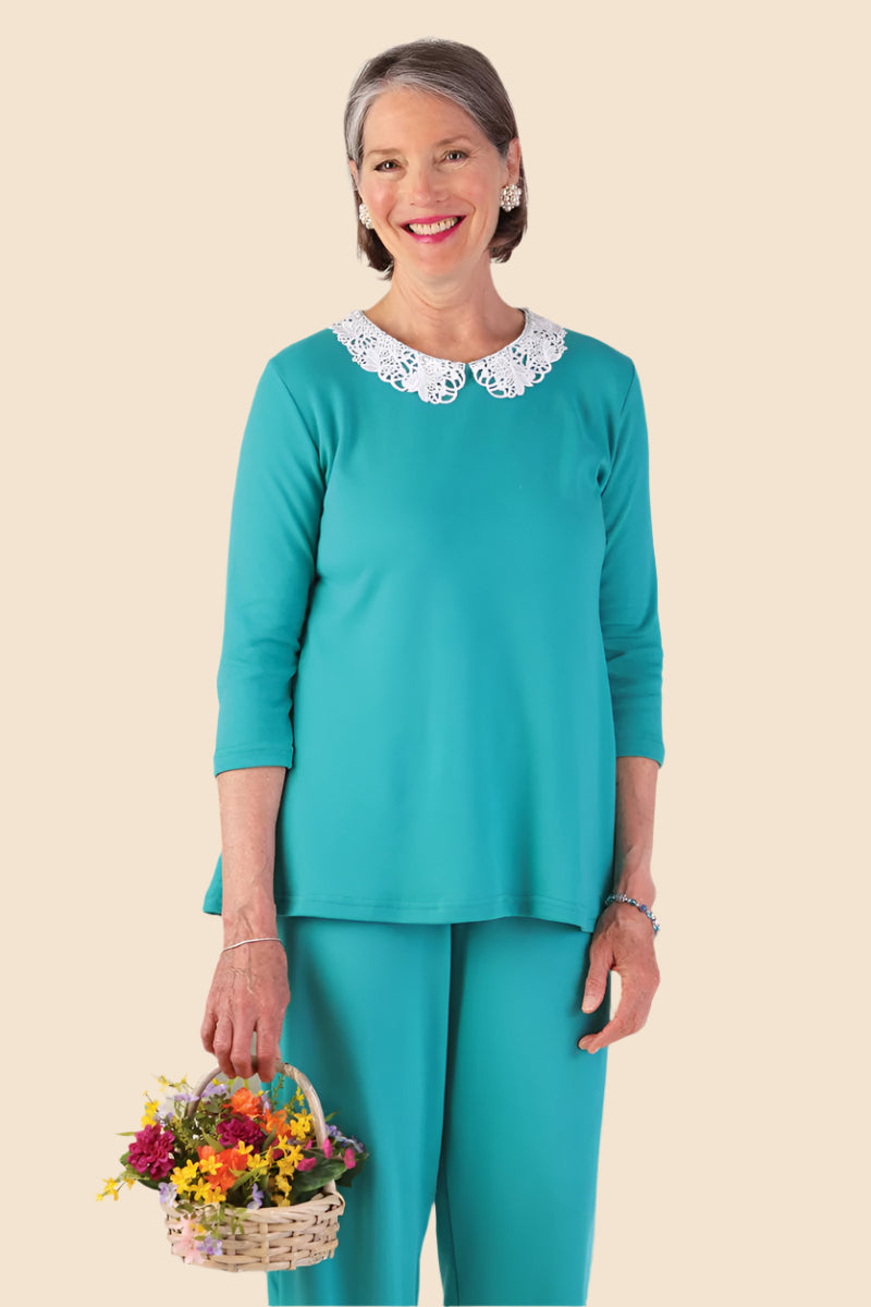 Knit Flare Top With Lace Collar for women by Buck & Buck in Jade, and available in different sizes. This tops item is part of our blouses collection.