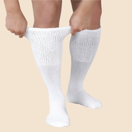 Extra Wide® Medical Tube Sock (3-Pack) by Buck & Buck in White, and available only in a one-size option. This socks & hosiery item is part of our athletic socks collection.