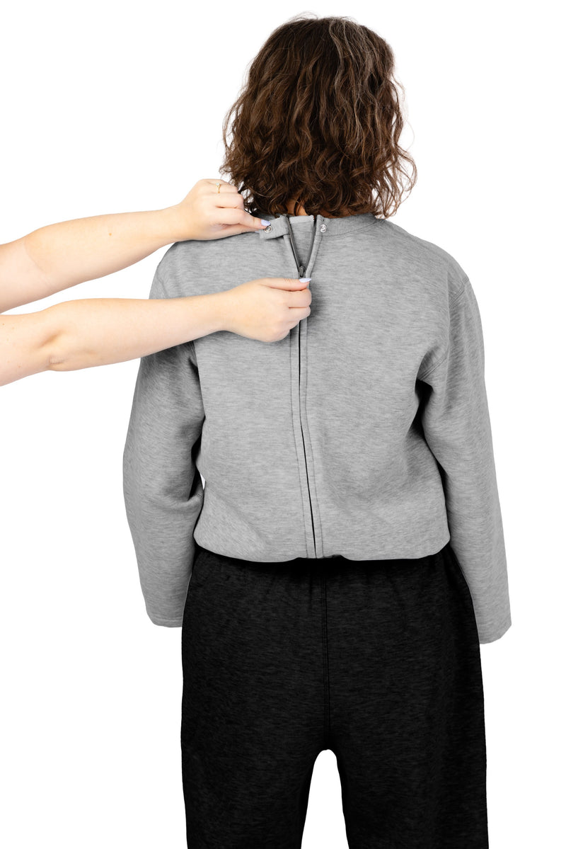 Women's Long Sleeve Fleece Jumpsuit by Buck & Buck in Gray Top/Black Pants, and available in different sizes. This one-piece garments item is part of our one-pieces collection.