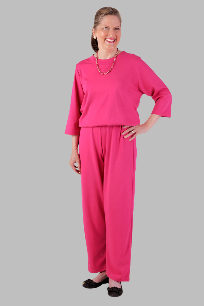 Women's Basic Perfect-Fit Jumpsuit by Buck & Buck in Red, and available in different sizes. This one-piece garments item is part of our one-pieces collection.