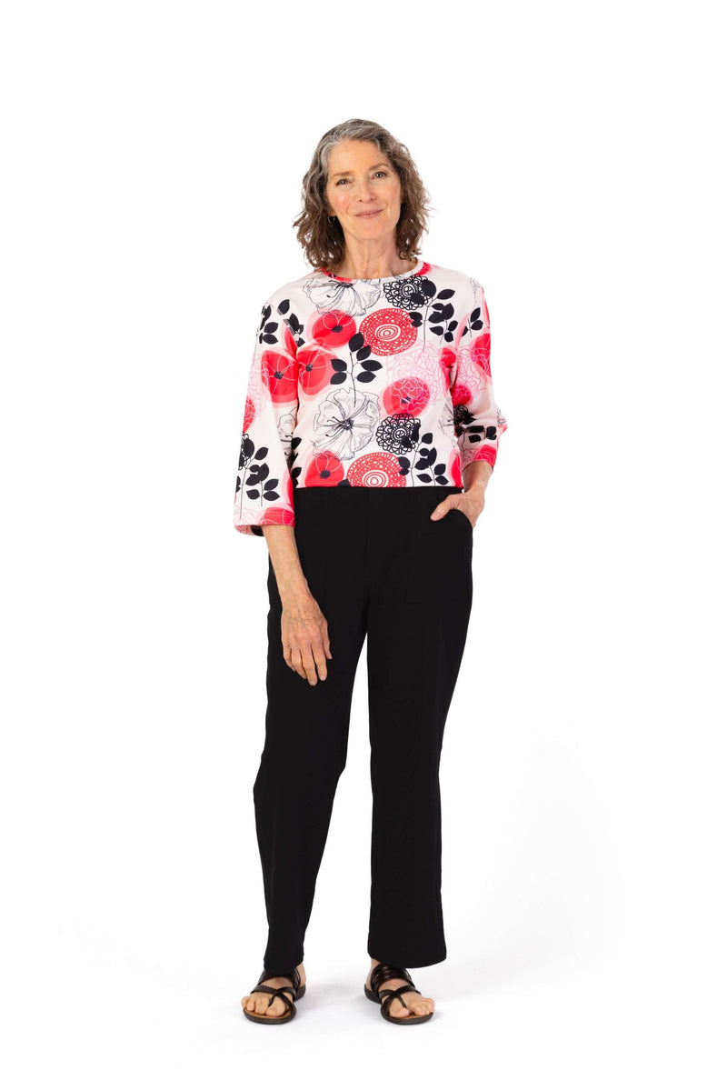 Women's Tunic Jumpsuit by Buck & Buck in Red Top/Black Pants, and available in different sizes. This one-piece garments item is part of our one-pieces collection.