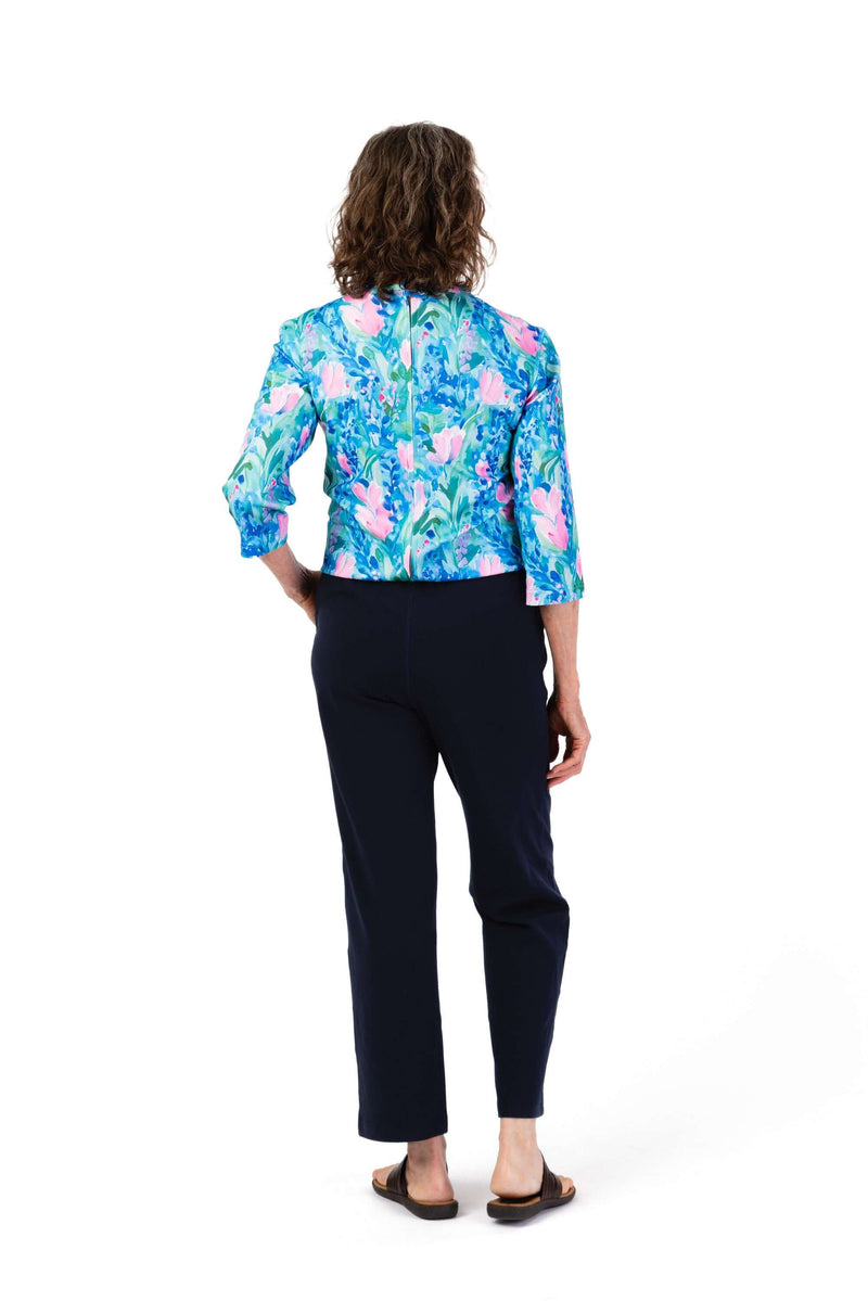 Women's Tunic Jumpsuit by Buck & Buck in Turquoise Top/Navy Pants, and available in different sizes. This one-piece garments item is part of our one-pieces collection.