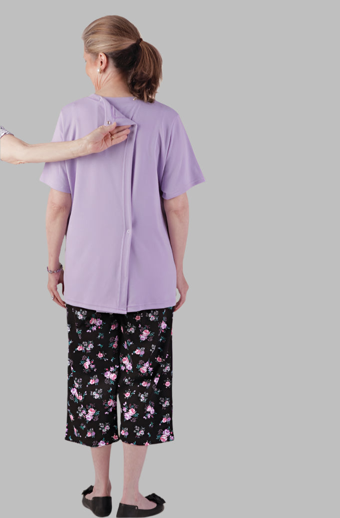 Women's Short Sleeve Wrap Back T-Shirt by Buck & Buck in Lilac, and available in different sizes. This tops item is part of our t-shirts collection.