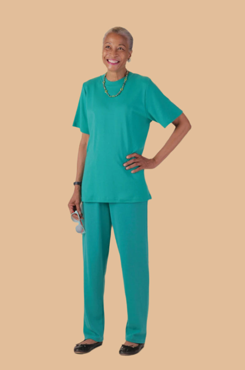 Women's Short Sleeve Wrap Back T-Shirt by Buck & Buck in Turquoise, and available in different sizes. This tops item is part of our t-shirts collection.