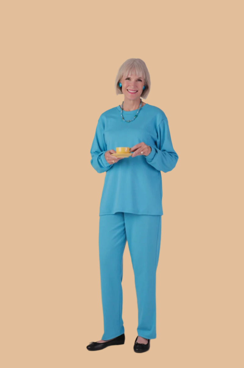 Women's Long Sleeve Wrap Back T-Shirt by Buck & Buck in Blue, and available in different sizes. This tops item is part of our t-shirts collection.