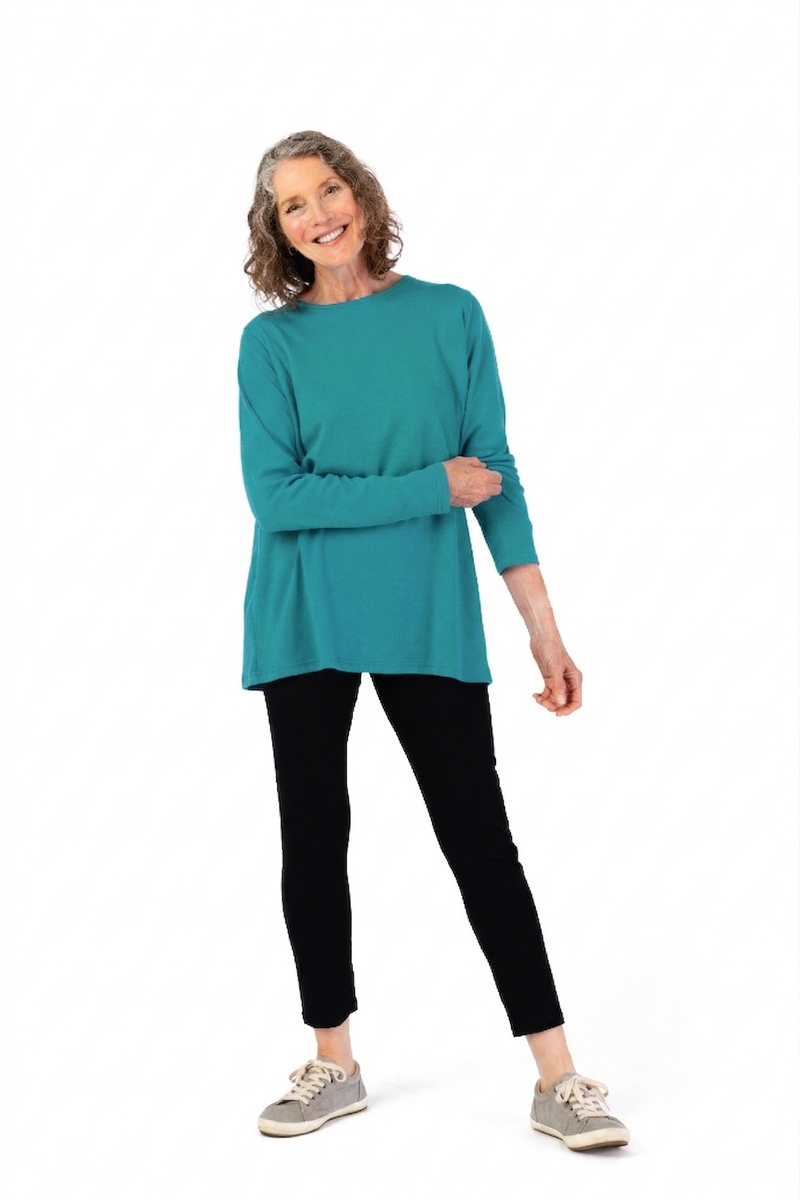 Women’s Long Sleeve Wrap Back T-Shirt + by Buck & Buck in jade, and available in different sizes. This shirt item is part of our tops collection.