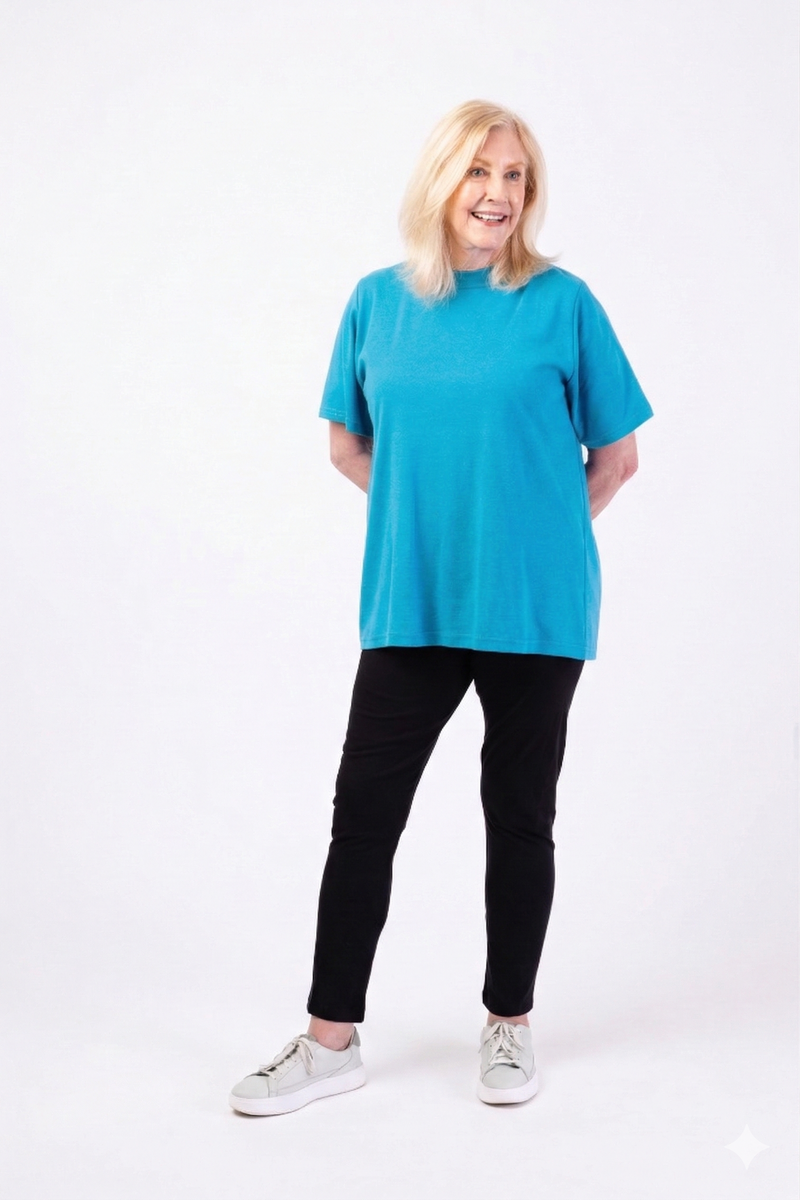 Women's Short Sleeve Wrap Back T-Shirt by Buck & Buck in turquoise, and available in different sizes. This tops item is part of our t-shirts collection.