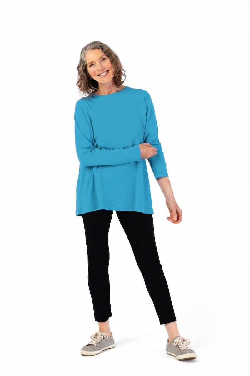 Women’s Long Sleeve Wrap Back T-Shirt + by Buck & Buck in turquoise, and available in different sizes. This shirt item is part of our tops collection.