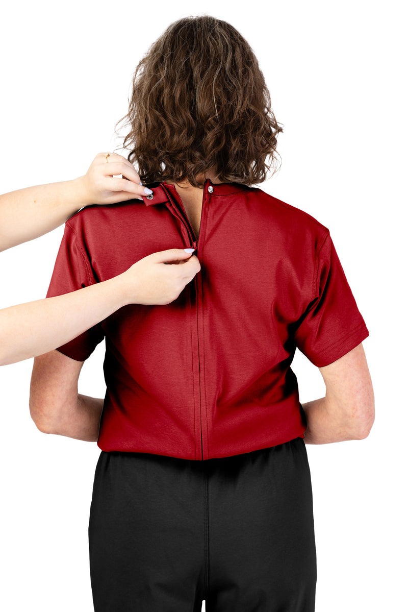 Women's Short Sleeve Jumpsuit by Buck & Buck in Red Top/Black Pants, and available in different sizes. This one-piece garments item is part of our one-pieces collection.