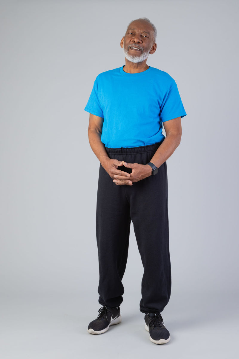 Men's Short Sleeve Basic T-Top Jumpsuit by Buck & Buck in turquoise Top/black Pants, and available in different sizes. This one-piece garments item is part of our one-pieces collection.