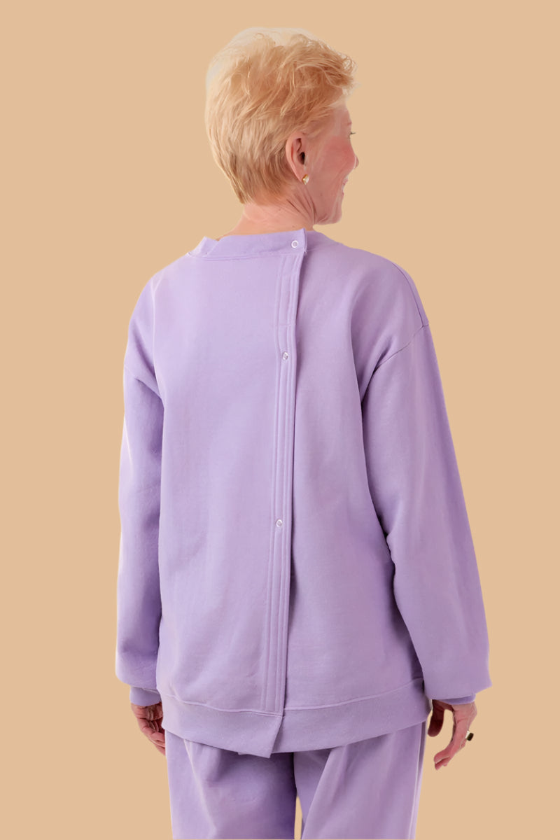 Women's Printed Wrap Back Sweat Top by Buck & Buck, and available in different sizes. This tops item is part of our sweatshirts collection.