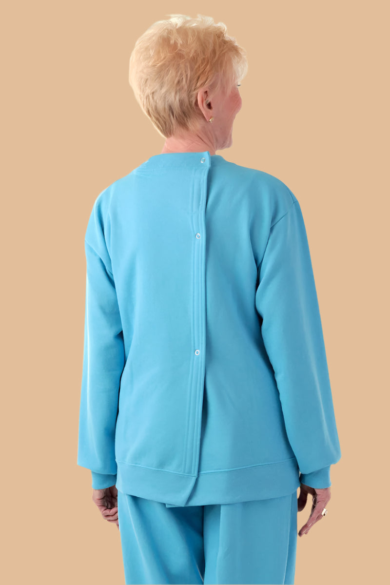 Women's Printed Wrap Back Sweat Top by Buck & Buck in Turquoise, and available in different sizes. This tops item is part of our sweatshirts collection.