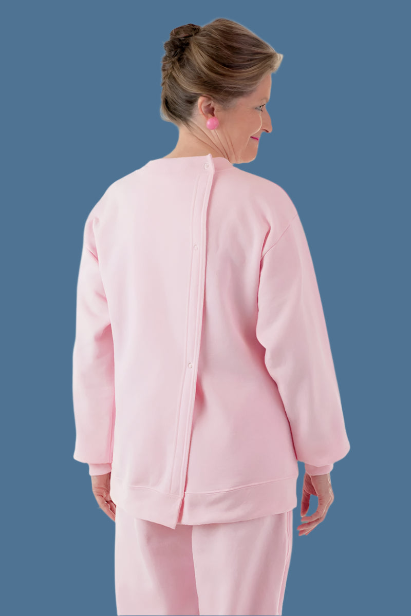 Women's Printed Wrap Back Sweat Top by Buck & Buck in Pink, and available in different sizes. This tops item is part of our sweatshirts collection.