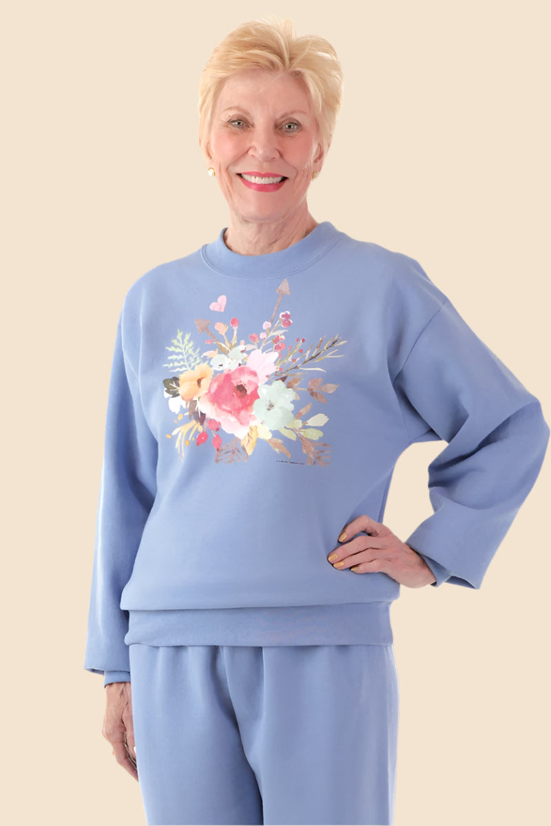 Women's Printed Wrap Back Sweat Top by Buck & Buck in Turquoise, and available in different sizes. This tops item is part of our sweatshirts collection.