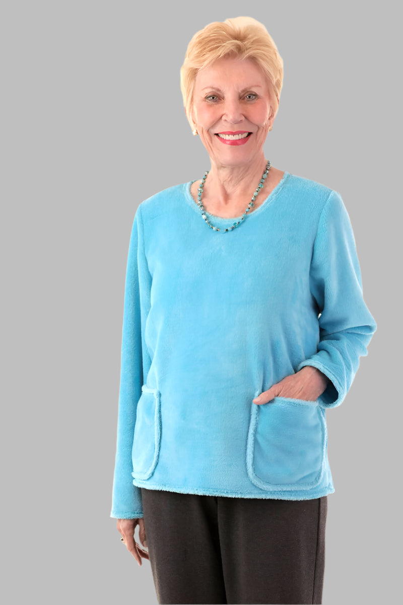 So-Soft Pocketed Top for women by Buck & Buck in Turquoise, and available in different sizes. This tops item is part of our sweaters collection.