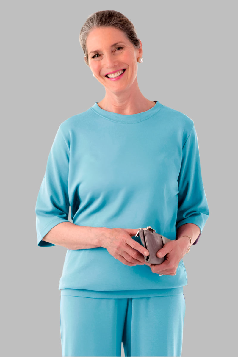 Women's 3/4 Sleeve Banded Bottom Top by Buck & Buck in Turquoise, and available in different sizes. This tops item is part of our blouses collection.